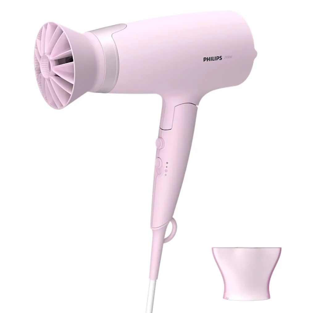 سشوار حرفه‌ای فیلیپس مدل BHD388 با توان 2100 وات، تنظیمات دما سه حالته، تنظیم سرعت دو سرعته، دارای دو سری متمرکزکننده پهن و باریک، خشک‌کنندگی قوی، حجم‌دهندگی و کاهش وز مو
