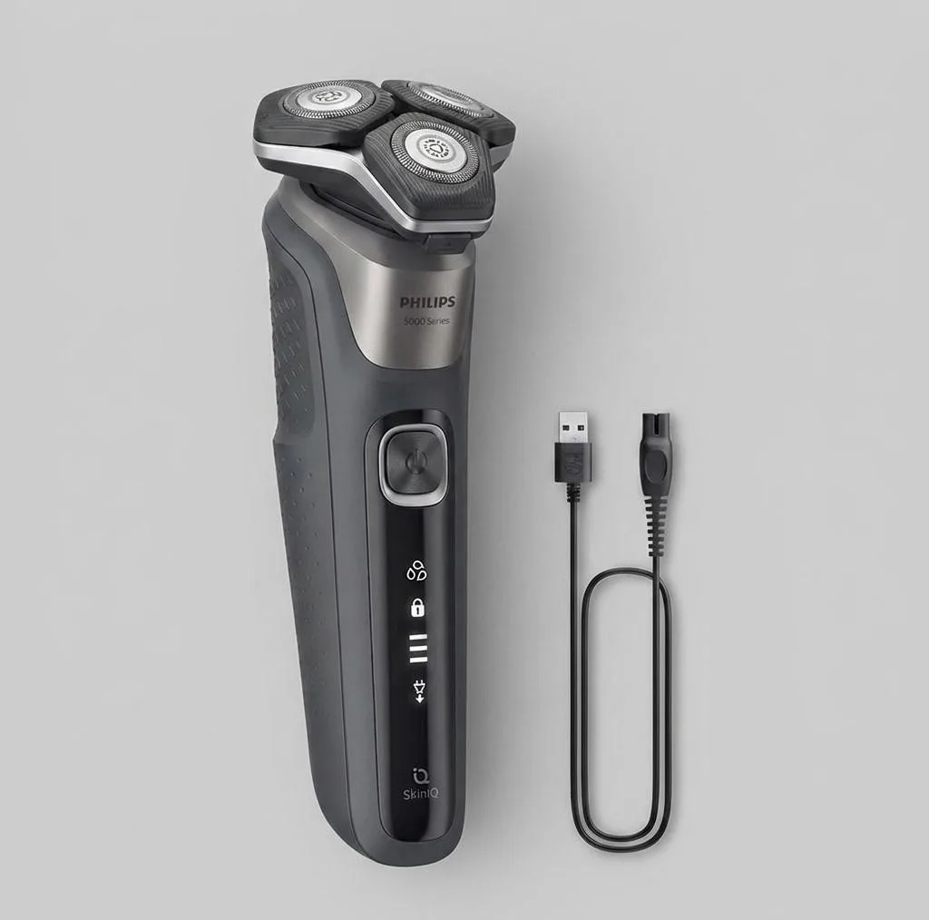 ماشین اصلاح موی صورت فیلیپس مدل SHAVER 5000 Series با تیغه‌های کربن استیل، سنسور هوشمند، سرهای انعطاف‌پذیر 360 درجه، ضد آب، قابلیت اصلاح با شماره صفر، شارژ سریع و منبع انرژی کابل USB